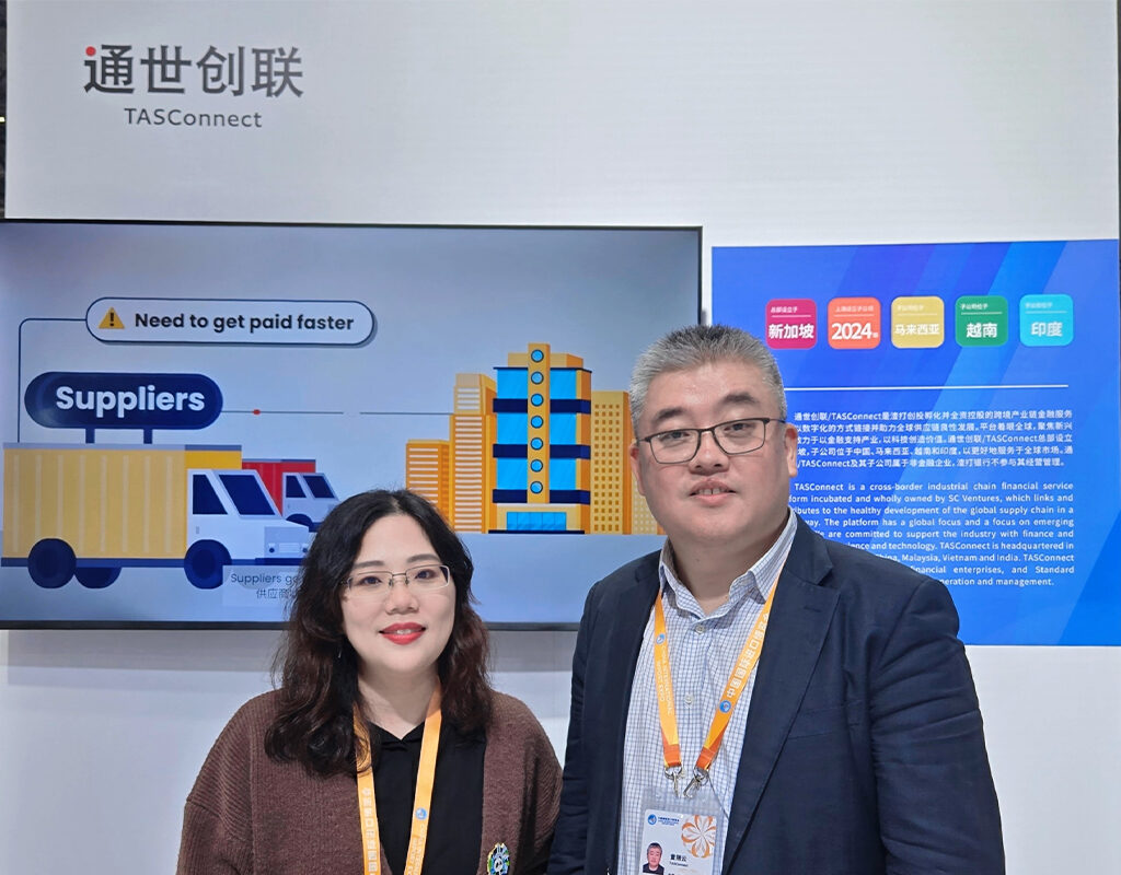 Yihong and Mike at CIIE 2025