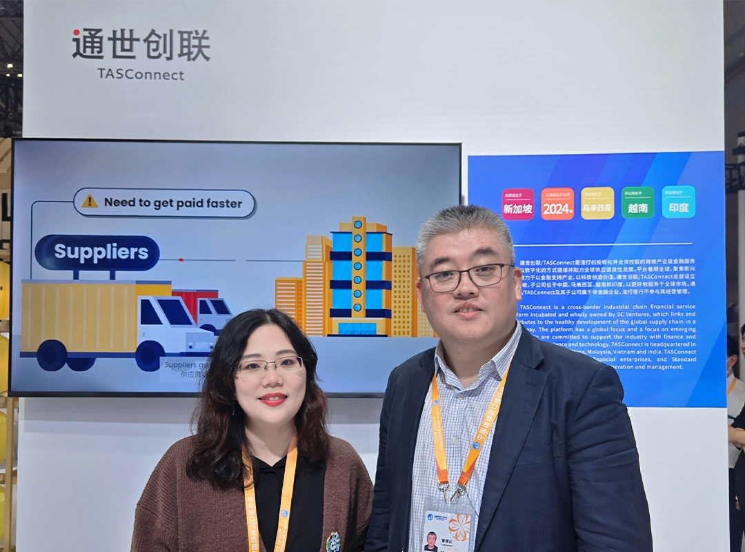 Yihong and Mike at CIIE 2025